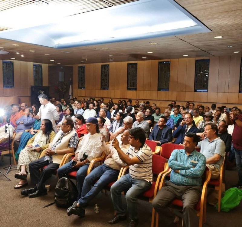The audience watched the documentary with deep interest and admiration.